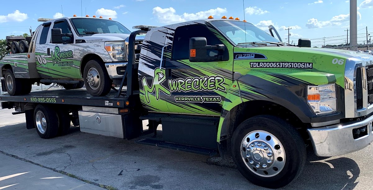 Tow truck towing a tow truck